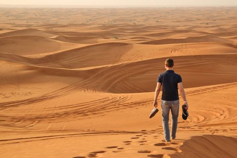 Man walking in desert