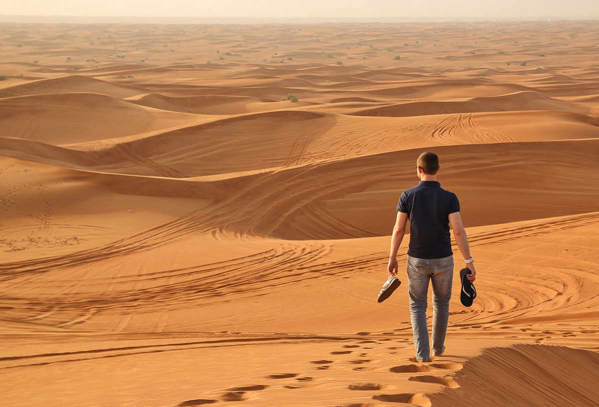 Man walking in desert